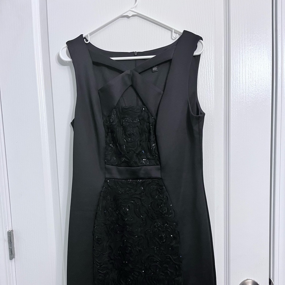 Black sleeveless cocktail dress. Size 12.